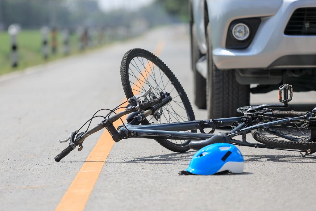 A bicycle accident scene in a Florida highway.