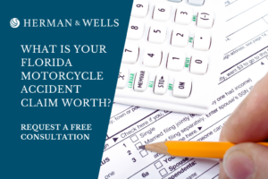 A Floridian involved in a motorcycle accident fills up a claim form.
