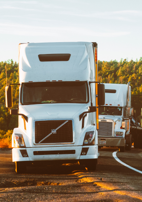 Trucks with cautious drivers navigate Florida highways with precision and care.