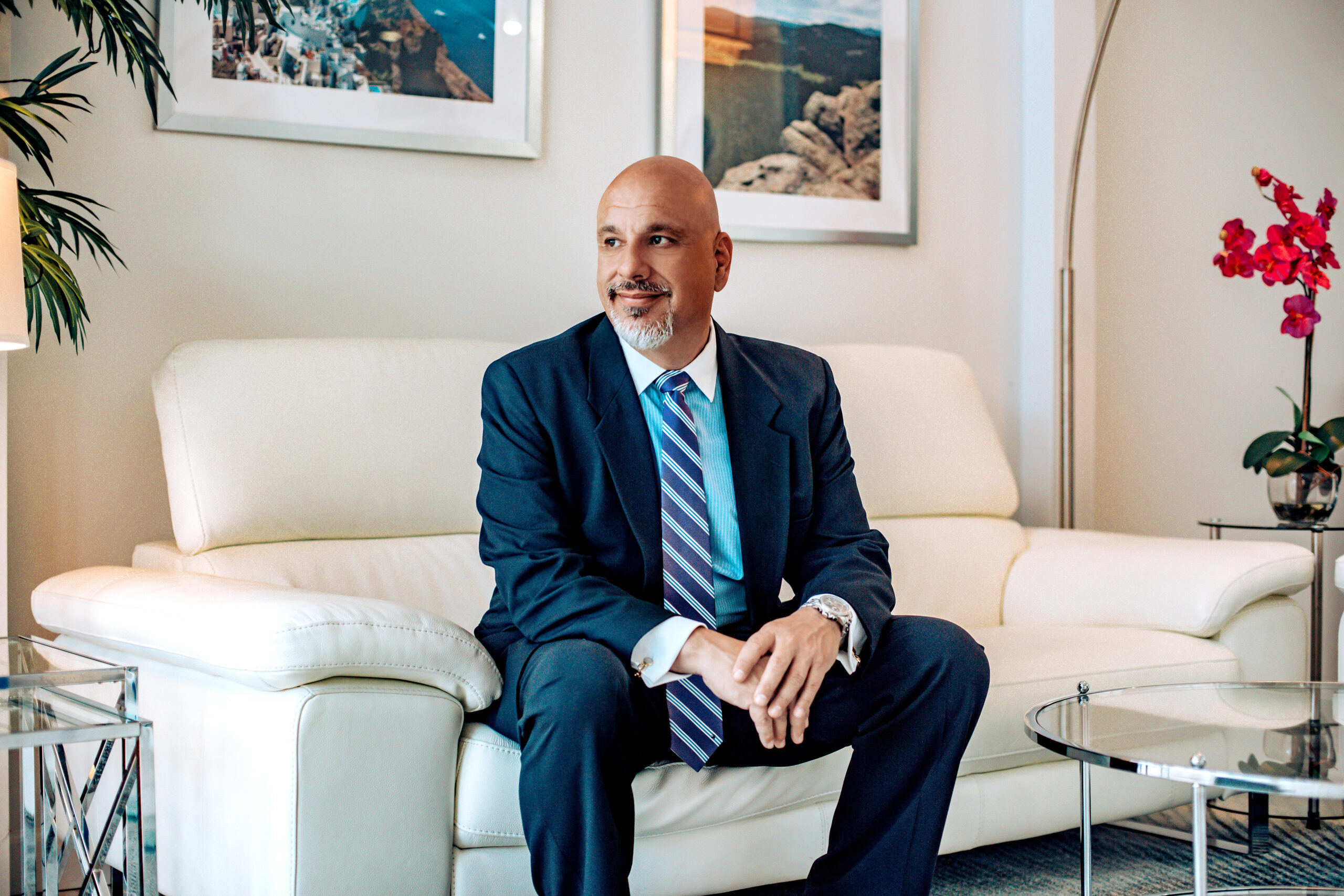 Our disability disputes lawyer, Bill Demas, sitting at the Herman & Well's office.